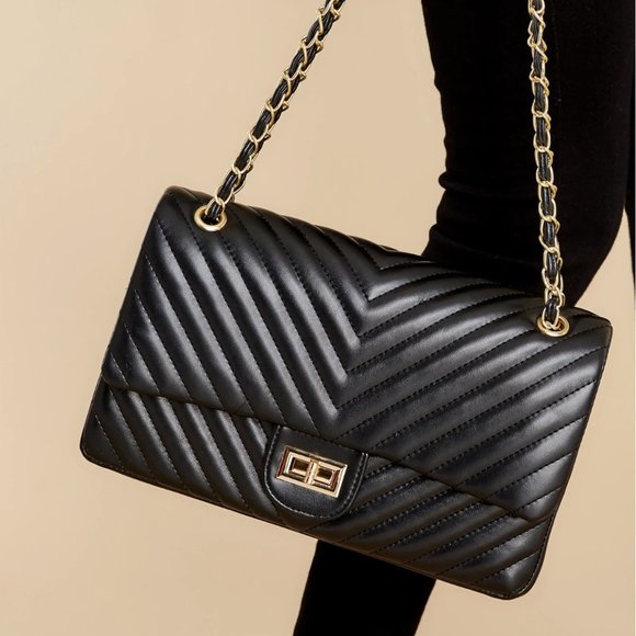 Handbags - Luxury designer purse.